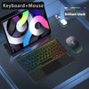 A black keyboard and mouse set with a tablet displaying a colorful interface, shown on a dark surface.