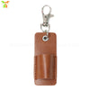 A brown leather pen holder keychain with a silver clasp.