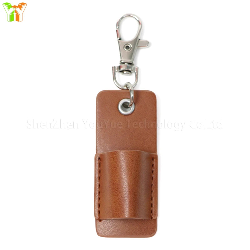 A brown leather pen holder keychain with a silver clasp.