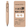 A light beige Uni-Ball One P gel pen with a metallic clip and a pointed tip.