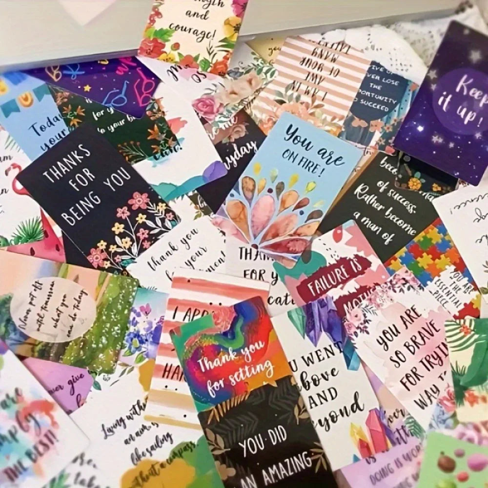 A colorful assortment of motivational greeting cards featuring various designs and messages.