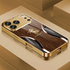 A golden phone case with a wood grain finish and a silver horse design resting on a light brown surface.
