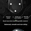 A close-up view of a black PTFE mouse skate with adhesive dots, highlighting its balanced and smooth design.