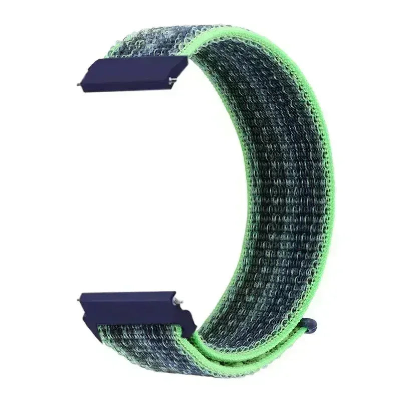 A close-up view of a green and gray nylon loop watch strap with purple adjustment pieces.