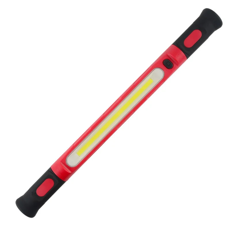 Magnetic rechargeable LED work light with a red and black body and a yellow light bar.