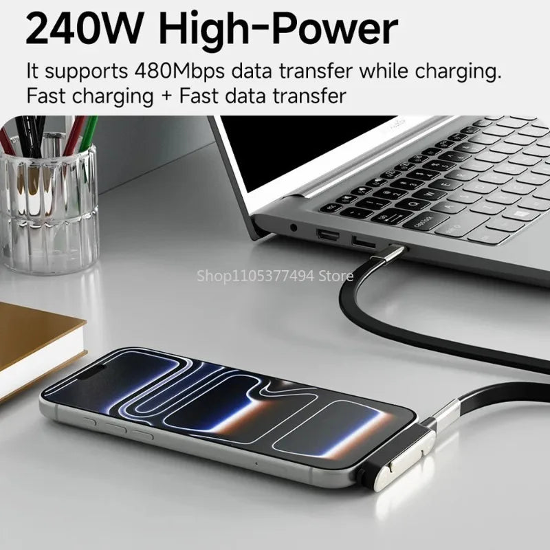 A silver 2-in-1 fast charging data cable with a phone stand is shown next to a laptop.