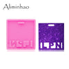 A pink silicone resin mold and a purple glitter resin mold for crafting projects.