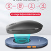 A black ultra-slim mouse mover device is shown with a blue light emitting from its tip, resting on a light blue base.