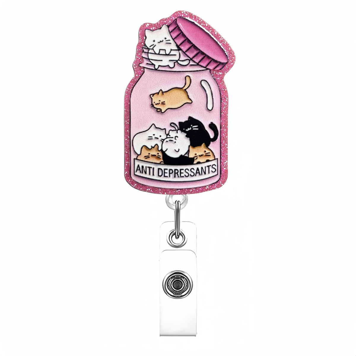 A pink badge reel featuring a cute cat design with multiple cats and the text ANTI DEPRESSANTS.