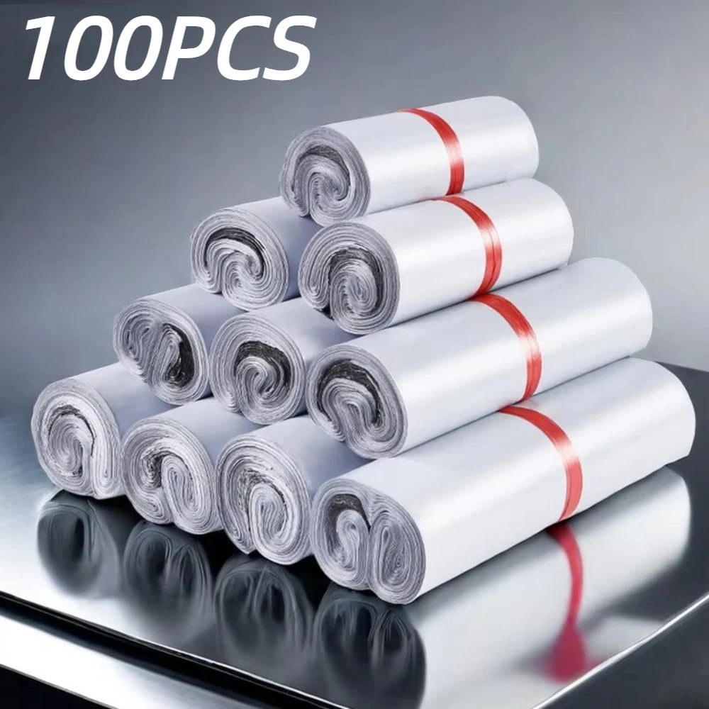 A stack of 100 rolls of white sealing dustproof mailing bags