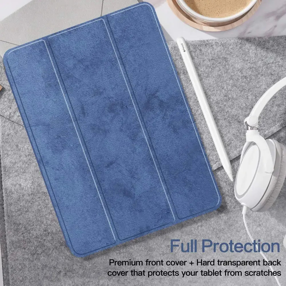 A blue silicone screen protector with a clear back is shown on a gray fabric surface next to a white stylus.