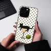 A black cat martini pattern hybrid phone case is held by a person against a light background.