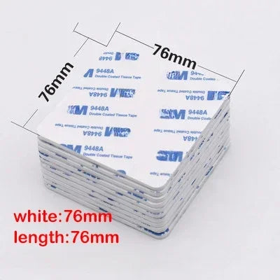 A stack of white heavy duty double-sided foam mounting tape with dimensions of 76mm by 76mm.