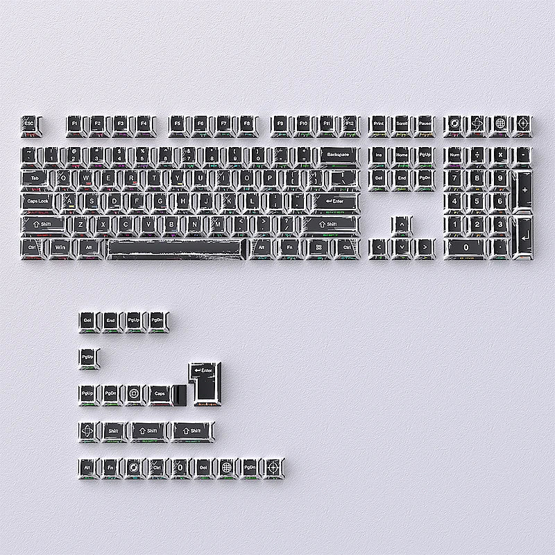 A set of colorful comic style mechanical keycaps arranged in a rectangular grid.