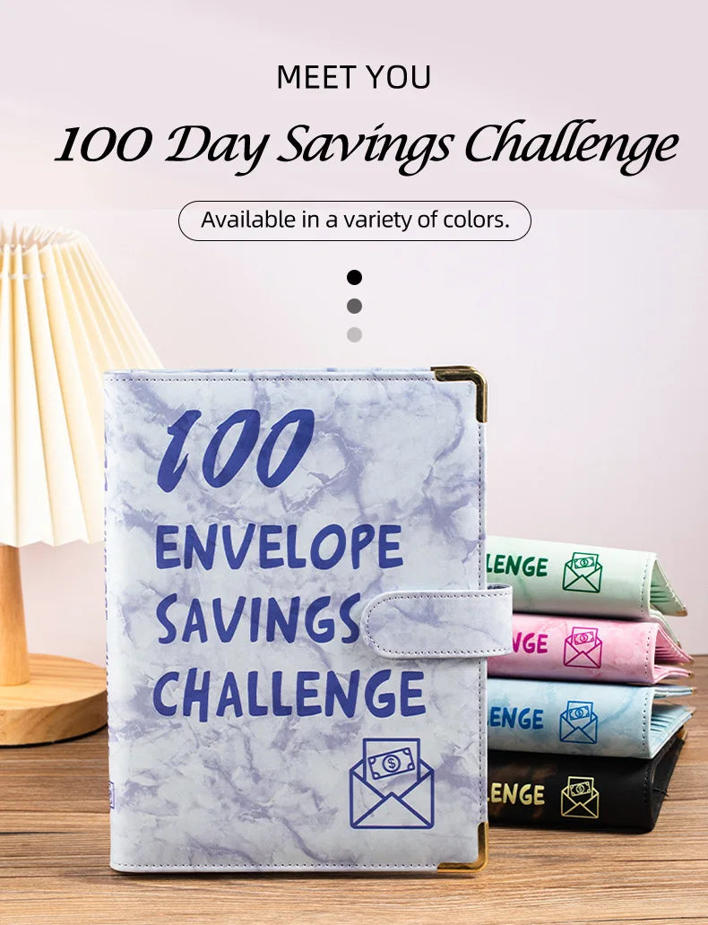 A marble-patterned budget binder with cash envelopes for a 100 Day Savings Challenge.