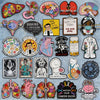 A collection of enamel pins featuring medical and healthcare themed designs for nurses, doctors, and other professionals.