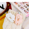 A collection of adorable cat paw mini cutters in various pastel colors, including pink, mint green, and white, displayed on a