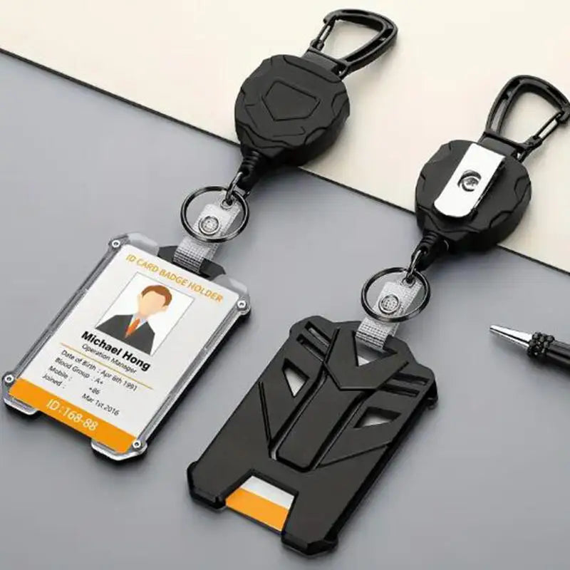 A black tactical ID badge holder keychain with a clear plastic card and metal ring attached.