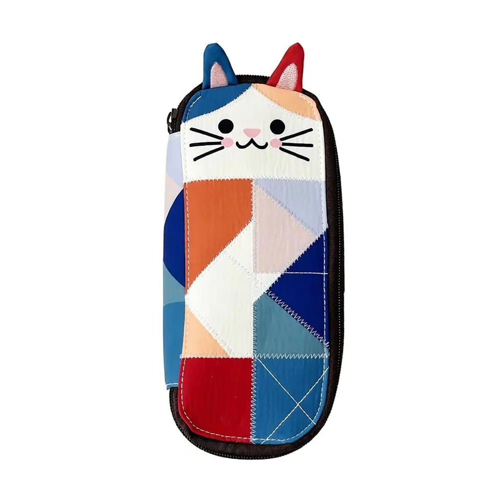 A patchwork cat face coin purse with a zipper featuring various colored fabric patches.