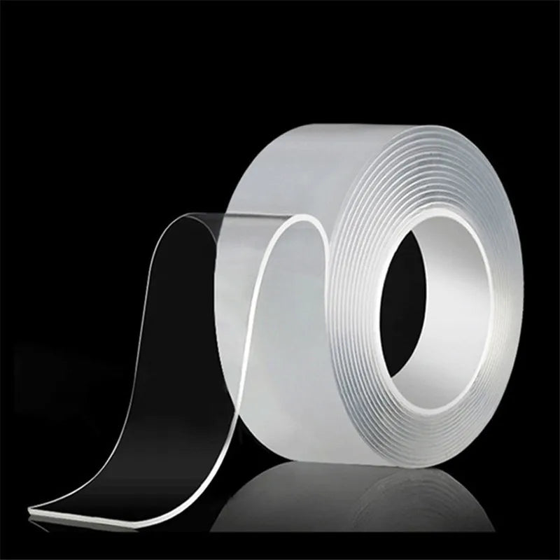 Roll of clear extra strong double-sided nano tape shown on a reflective surface.
