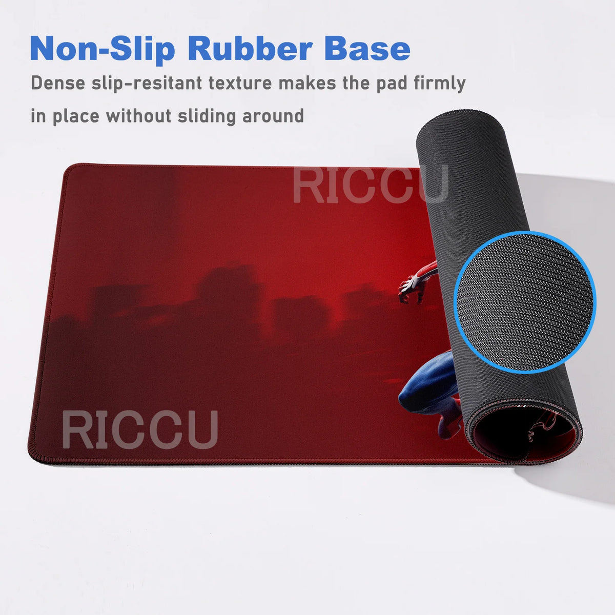 A dark red desk mat with a non-slip rubber base and a rolled black mat shown next to it.