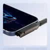 Close-up view of a black USB-C adapter with a foldable stand and curved rounded corners