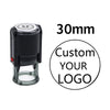 A black self-inking stamp with a clear plate, showing a measurement of 30mm.