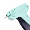 A light mint green professional apparel tagging gun with a needle tip shown in a close-up view.