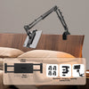 A black adjustable tablet holder with a long arm is shown mounted on a wooden surface.