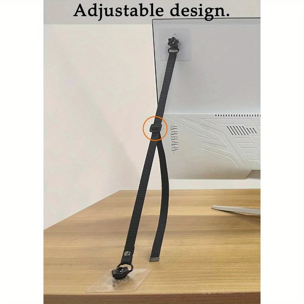 A black adjustable TV safety strap is shown attached to a wall, demonstrating its use for baby proofing furniture.