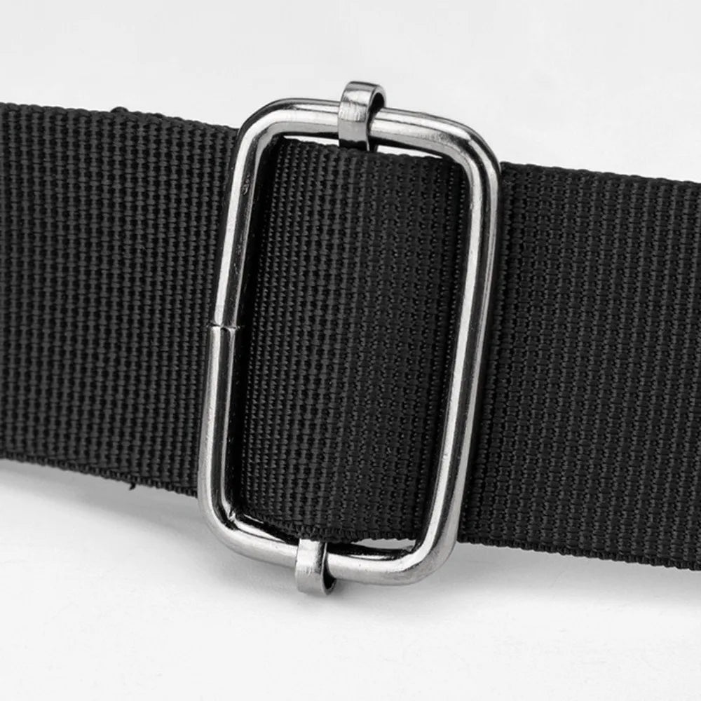 Black leather strap with a silver buckle for an Oxford cloth crossbody briefcase.