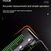 A close-up of a black zero point correction ruler hook measuring tape on a dark surface.