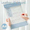 A blue leather clipboard with lined paper and a pen is shown, featuring contrast stitching.