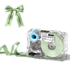 A clear label maker device with a ribbon and bow, used for creating custom stickers.