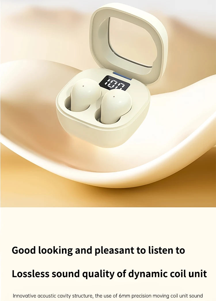 White mini Bluetooth earphones with a protective case resting on a beige surface.