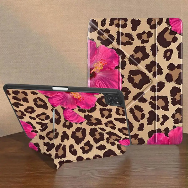A leopard print protective case for an iPad, featuring pink flowers and brown background.