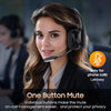 A woman wearing a black Bluetooth headset for phone calls is smiling and looking at the camera.