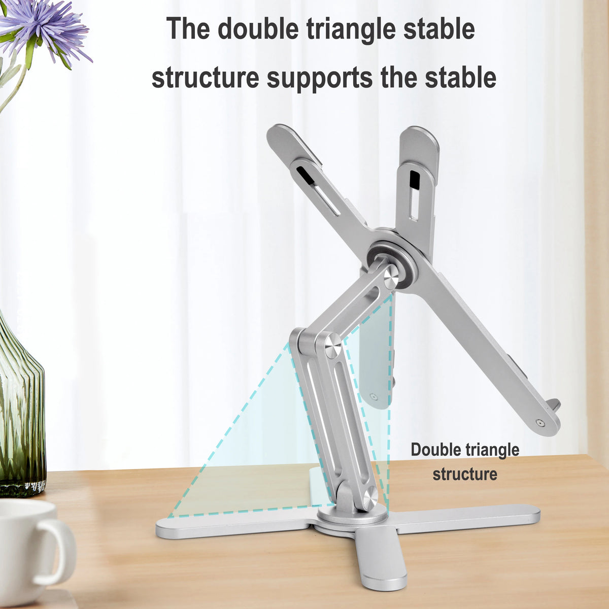 A silver 360° adjustable laptop and tablet stand featuring a double triangle stable structure.