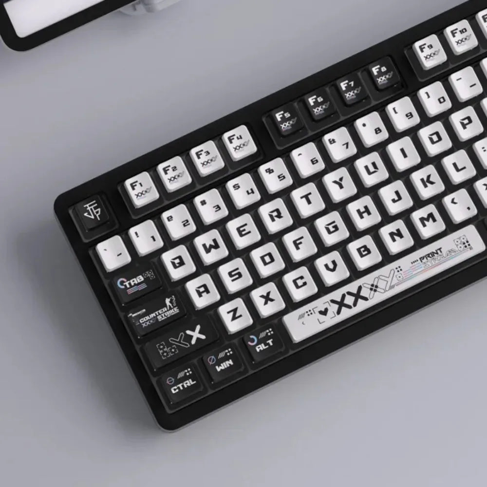 A close-up view of a black mechanical keyboard featuring transparent pudding style PBT keycaps.