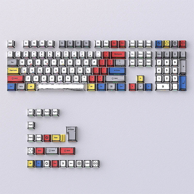 A full set of colorful comic style mechanical keycaps for a keyboard, including alphanumeric keys and modifiers.
