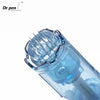 Close-up view of a clear Dr. pen microneedling cartridge with a silver needle tip.
