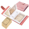 A set of pink leather seed storage organizers with internal paper sleeves and a cardboard folder.