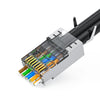 Close-up view of CAT6/CAT7 modular RJ45 connectors with various colored cables attached to a silver connector housing.
