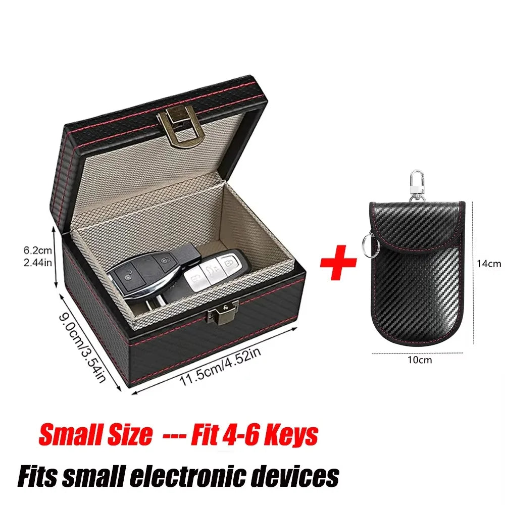 Black leather RFID blocking key fob protector case with a hinged lid and magnetic closure