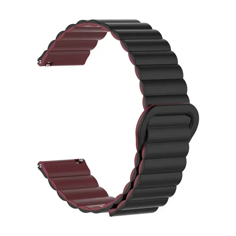 A close-up view of a dark maroon and black adjustable magnetic loop watch band.