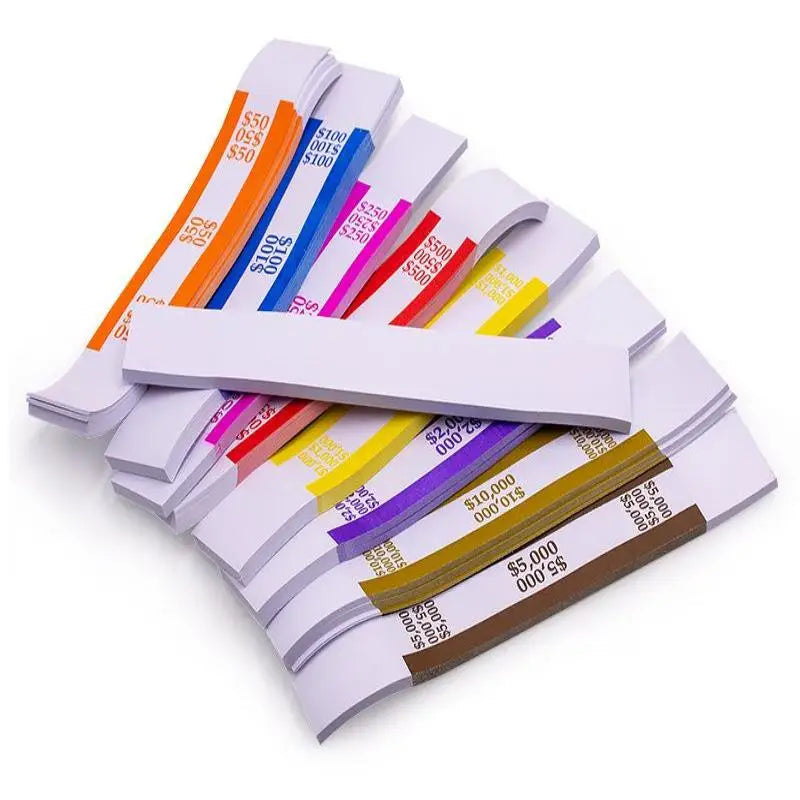 A stack of self-sealing money straps in various colors and denominations, laid out diagonally.