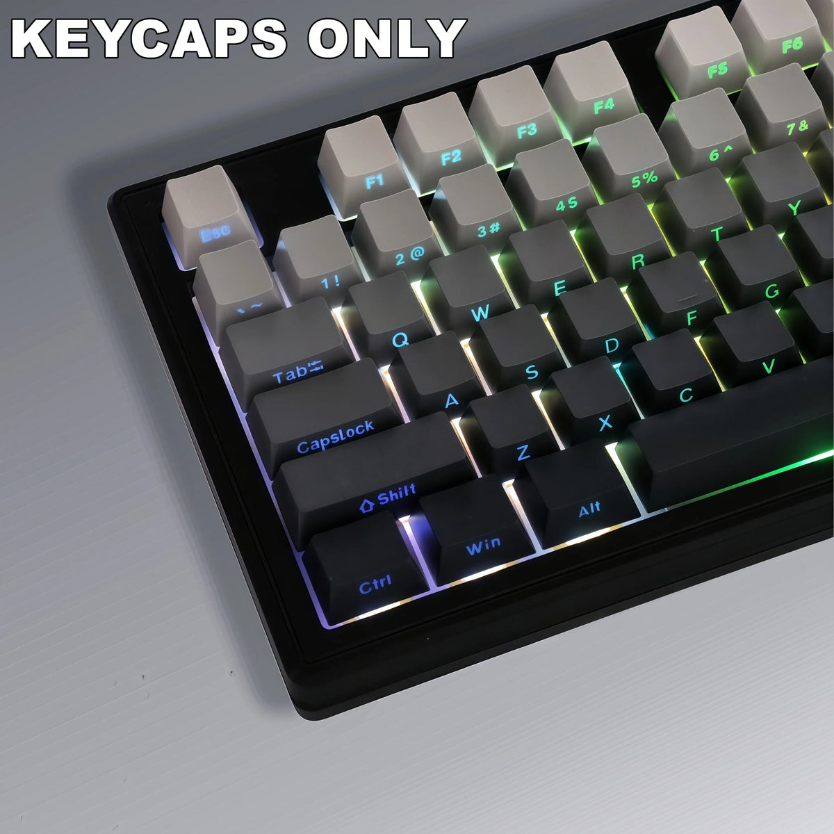 A close-up view of a set of light gray PBT keycaps for mechanical keyboards.