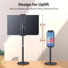 A black adjustable desktop monitor stand is shown with a monitor elevated from 24cm to 47cm.