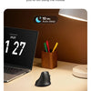 A black ergonomic vertical wireless mouse is shown next to a laptop, illustrating intelligent sleep features.