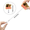 A hand holds a retractable acrylic nurse ID badge holder with a leopard print charm and a chain.